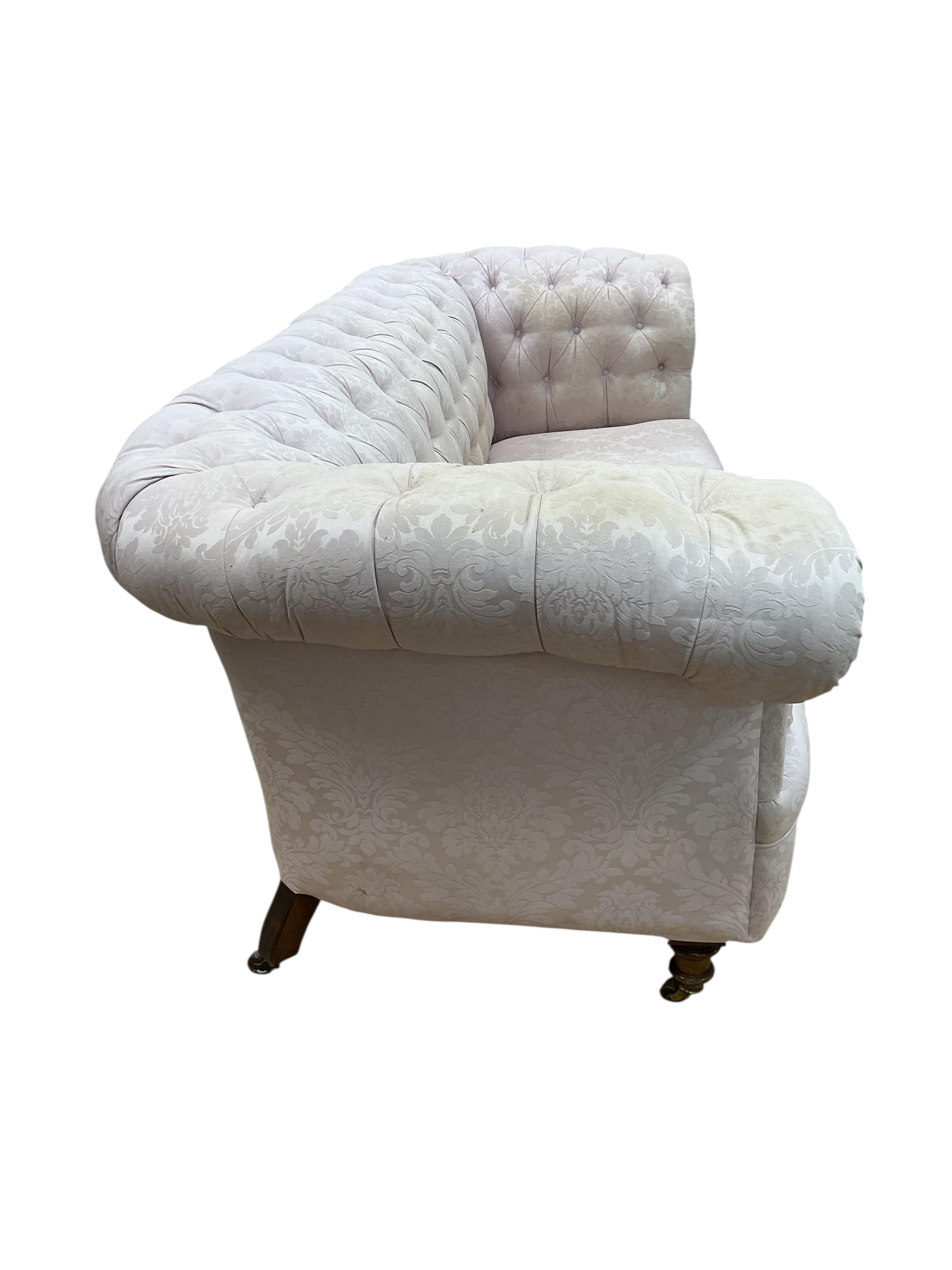 A Victorian deep buttoned Chesterfield settee, width 236cm, depth 91cm, height 84cm